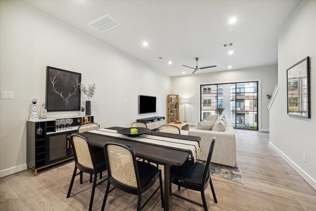 dining room with visible vents, light wood-style flooring, ceiling fan, and recessed lighting