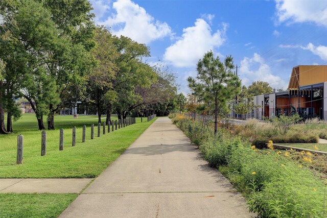 surrounding community featuring a yard