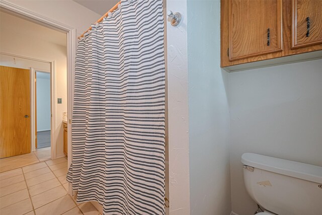 26003 Fountaine Bleau Dr, Tomball, TX 77377 - full bathroom with tile patterned floors and toilet