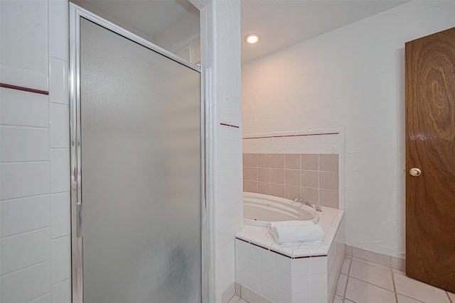 26003 Fountaine Bleau Dr, Tomball, TX 77377 - bathroom featuring a bath, a shower stall, tile patterned flooring, and recessed lighting