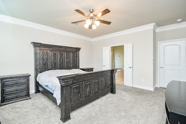 bedroom with visible vents, ornamental molding, baseboards, light colored carpet, and ceiling fan