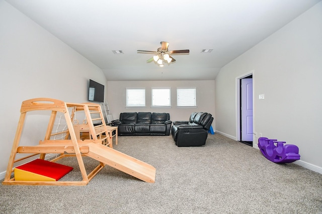 carpeted living area with baseboards, a ceiling fan, and visible vents