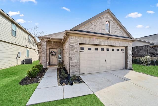 17530 Holroyd Rd, Humble, TX 77346 - view of front of house featuring central air condition unit, a garage, a front lawn, and concrete driveway