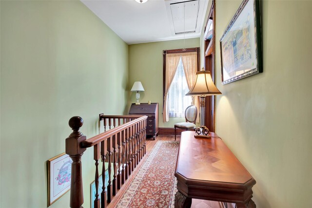 corridor featuring attic access