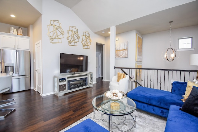 living area featuring a chandelier, wood finished floors, lofted ceiling, baseboards, and recessed lighting