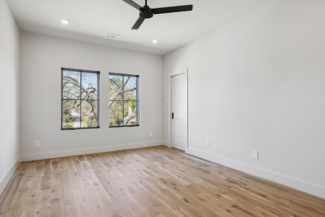 519 Milwaukee St, Houston, TX 77009 - unfurnished room with light wood finished floors, baseboards, visible vents, and ceiling fan
