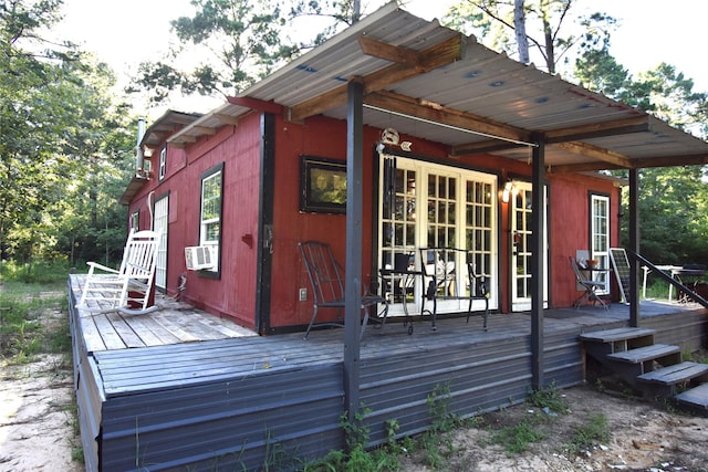 exterior space featuring cooling unit and french doors