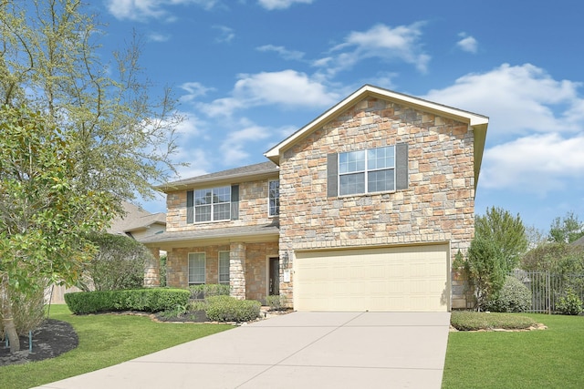 traditional-style home featuring fence, a front yard, stone siding, concrete driveway, and an attached garage