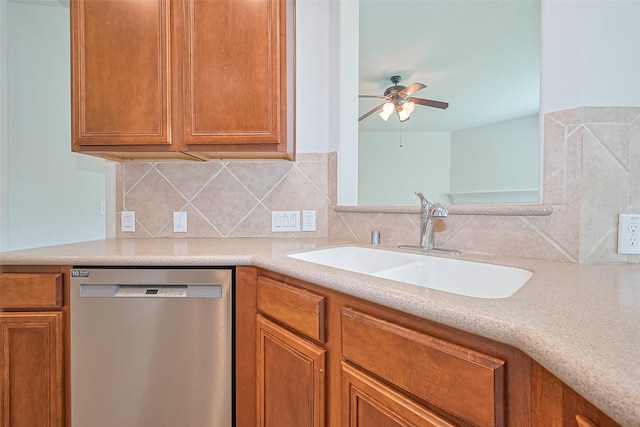 13600 Breton Ridge St Unit 22D, Houston, TX 77070 - kitchen featuring stainless steel dishwasher, a sink, light countertops, and a ceiling fan