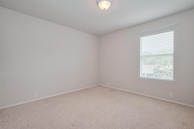 13600 Breton Ridge St Unit 22D, Houston, TX 77070 - carpeted spare room featuring baseboards