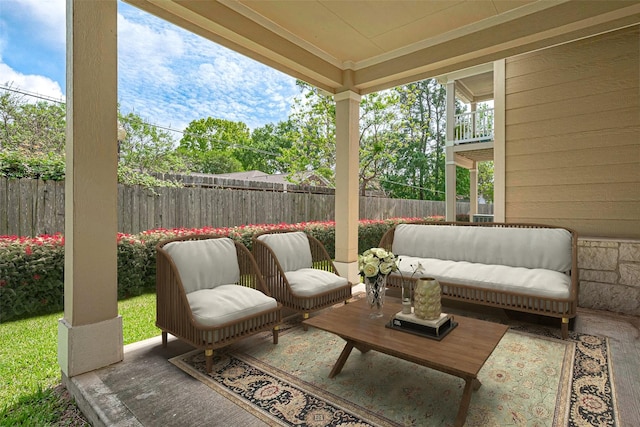 13600 Breton Ridge St Unit 22D, Houston, TX 77070 - fenced backyard with an outdoor living space and a patio