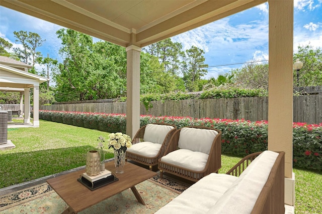 13600 Breton Ridge St Unit 22D, Houston, TX 77070 - view of patio featuring an outdoor hangout area and central AC