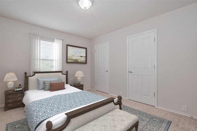 13600 Breton Ridge St Unit 22D, Houston, TX 77070 - bedroom featuring carpet floors and baseboards