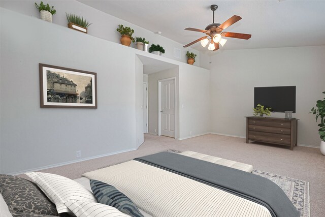 13600 Breton Ridge St Unit 22D, Houston, TX 77070 - bedroom featuring light colored carpet, baseboards, lofted ceiling, and ceiling fan