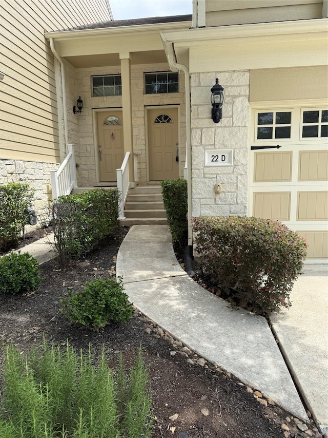13600 Breton Ridge St Unit 22D, Houston, TX 77070 - view of exterior entry with stone siding