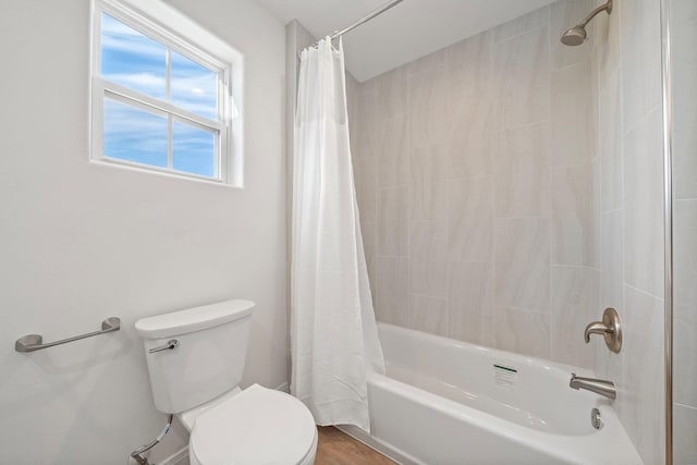 20919 W Sunset Bay Dr, Galveston, TX 77554 - bathroom featuring toilet and shower / bathtub combination with curtain