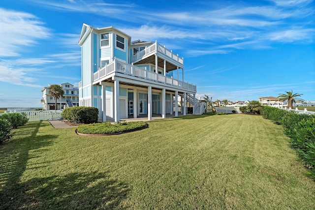 20919 W Sunset Bay Dr, Galveston, TX 77554 - back of house with a deck