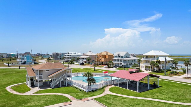 20919 W Sunset Bay Dr, Galveston, TX 77554 - aerial perspective of suburban area with a pool area