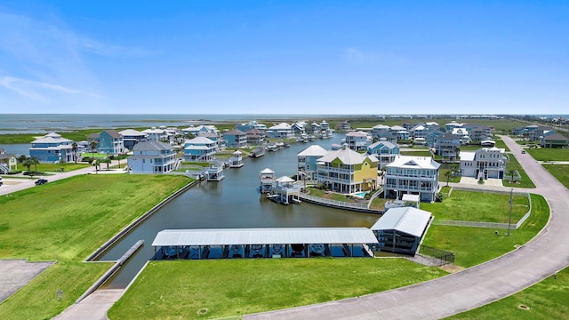 20919 W Sunset Bay Dr, Galveston, TX 77554 - aerial perspective of suburban area featuring a large body of water