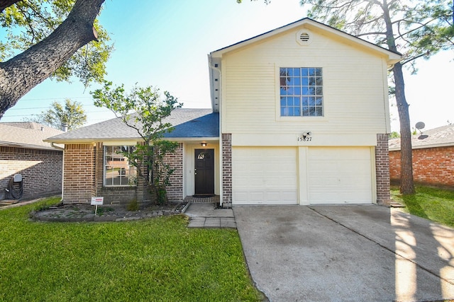15827 Tammany Ln, Houston, TX 77082 - traditional home with driveway, a front yard, an attached garage, brick siding, and a shingled roof