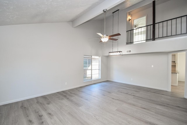 15827 Tammany Ln, Houston, TX 77082 - spare room featuring beam ceiling, a ceiling fan, wood finished floors, baseboards, and visible vents