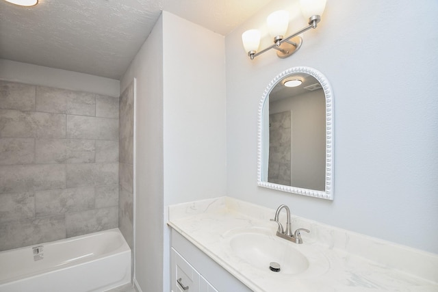 15827 Tammany Ln, Houston, TX 77082 - full bathroom with shower / tub combination, vanity, and a textured ceiling