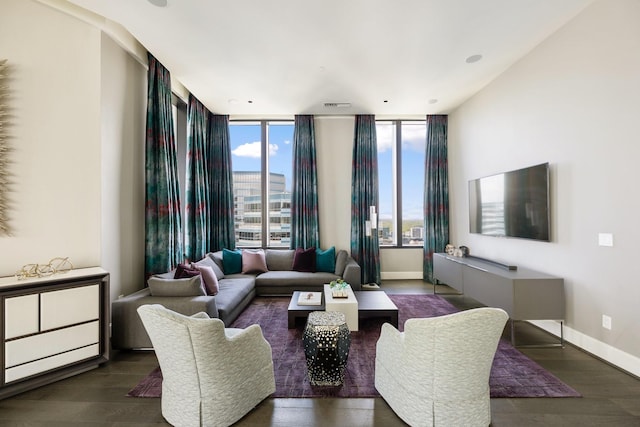 1409 Post Oak Blvd Unit 2702, Houston, TX 77056 - living room featuring baseboards and wood finished floors