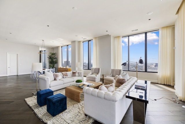 1409 Post Oak Blvd Unit 2702, Houston, TX 77056 - living room featuring plenty of natural light, dark wood-style flooring, baseboards, and visible vents