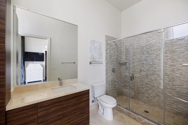 1409 Post Oak Blvd Unit 2702, Houston, TX 77056 - bathroom featuring toilet, a stall shower, vanity, and tile patterned flooring