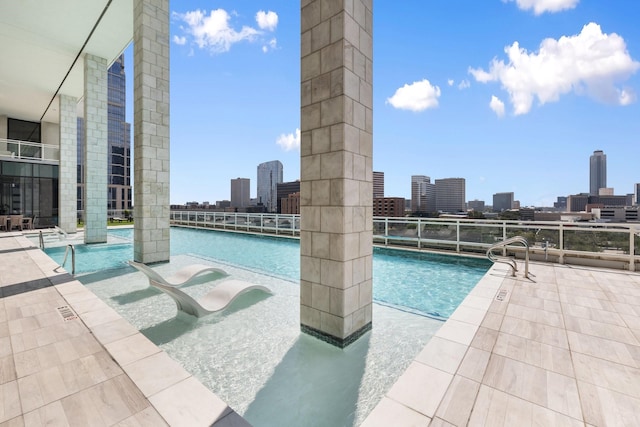 1409 Post Oak Blvd Unit 2702, Houston, TX 77056 - pool featuring a view of city