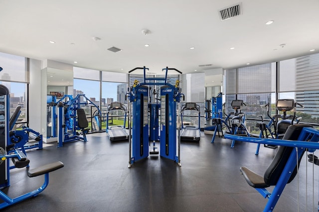 1409 Post Oak Blvd Unit 2702, Houston, TX 77056 - gym with visible vents, recessed lighting, and expansive windows