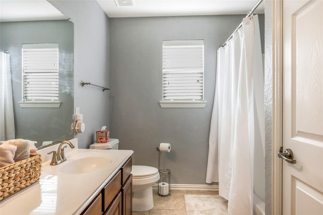 14711 E Ginger Spice Ct, Cypress, TX 77433 - full bathroom with vanity, toilet, a shower with shower curtain, and tile patterned flooring
