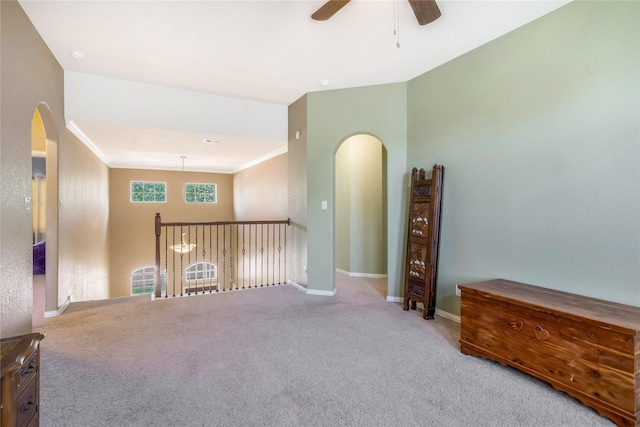 14711 E Ginger Spice Ct, Cypress, TX 77433 - carpeted empty room featuring arched walkways, a ceiling fan, and baseboards