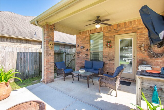 14711 E Ginger Spice Ct, Cypress, TX 77433 - view of patio with ceiling fan, an outdoor hangout area, and fence
