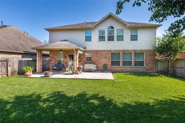 14711 E Ginger Spice Ct, Cypress, TX 77433 - rear view of house with a patio area and brick siding