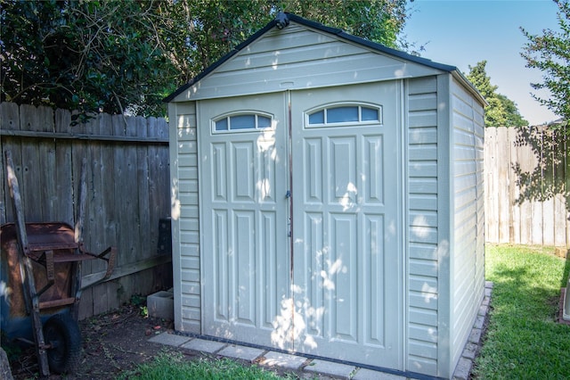 14711 E Ginger Spice Ct, Cypress, TX 77433 - view of shed with a fenced backyard
