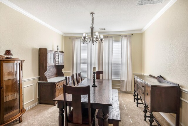 14711 E Ginger Spice Ct, Cypress, TX 77433 - dining area with a chandelier, light colored carpet, ornamental molding, a textured ceiling, and a textured wall