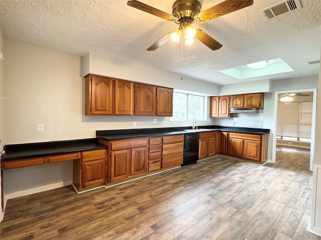 9611 Huntington Hill Dr, Houston, TX 77099 - kitchen with dishwasher, a textured ceiling, brown cabinets, and dark wood-style floors