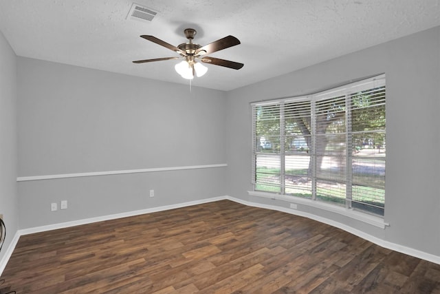 9611 Huntington Hill Dr, Houston, TX 77099 - empty room featuring wood finished floors, ceiling fan, baseboards, and a textured ceiling