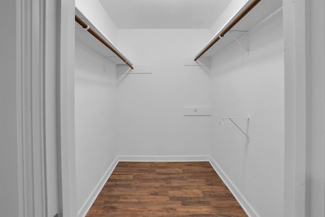 9611 Huntington Hill Dr, Houston, TX 77099 - walk in closet featuring dark wood-type flooring