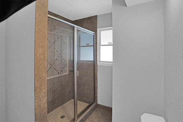 9611 Huntington Hill Dr, Houston, TX 77099 - full bath with a shower stall, tile patterned floors, and toilet