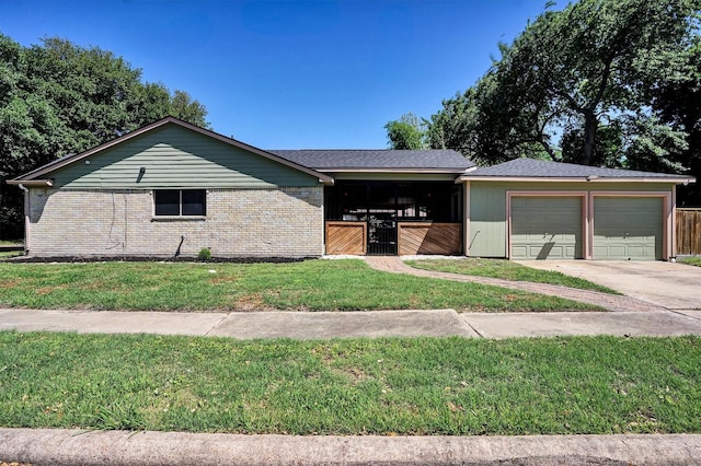 9611 Huntington Hill Dr, Houston, TX 77099 - ranch-style house featuring an attached garage, a front yard, driveway, and brick siding