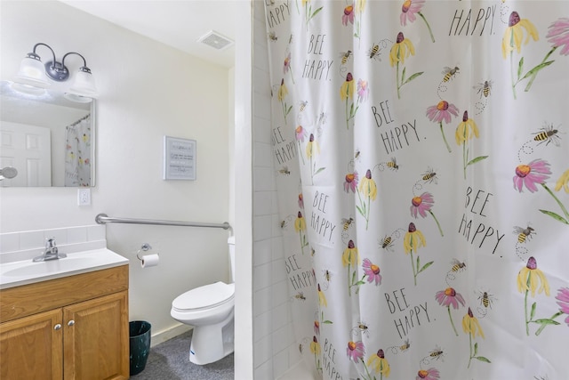 2585 State Highway 150, Coldspring, TX 77331 - bathroom with vanity and a shower with shower curtain