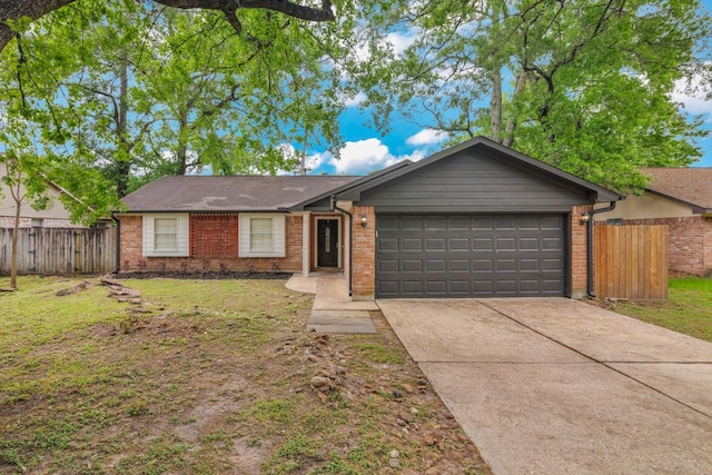 3306 Brookdale Dr, Houston, TX 77339 - ranch-style home featuring fence, an attached garage, concrete driveway, and brick siding