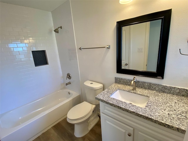 5217 Malmedy Rd A/B, Unit A/B Houston, TX 77033 - bathroom featuring vanity, wood finished floors, and shower / bathtub combination