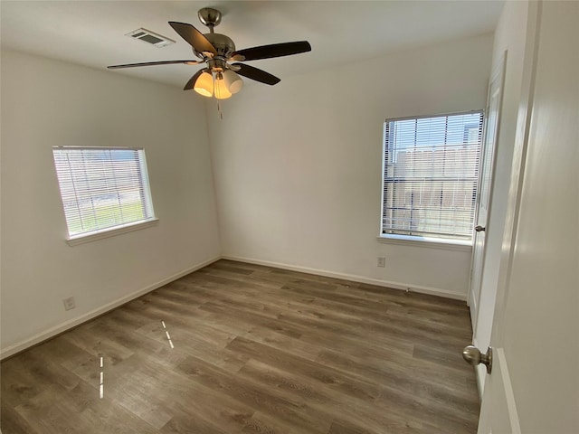 5217 Malmedy Rd A/B, Unit A/B Houston, TX 77033 - unfurnished room with wood finished floors and a ceiling fan