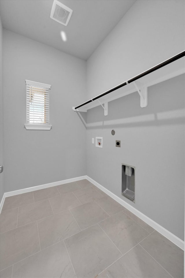 laundry room featuring electric dryer hookup, hookup for a gas dryer, washer hookup, visible vents, and laundry area