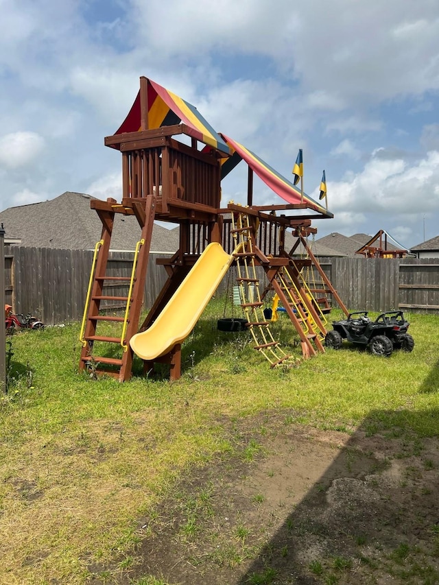 7707 Wrightwood Dr, Pasadena, TX 77505 - view of jungle gym featuring a fenced backyard and a yard