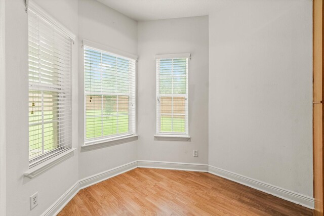 104 Mccardell Ln, Livingston, TX 77351 - spare room featuring baseboards and wood finished floors