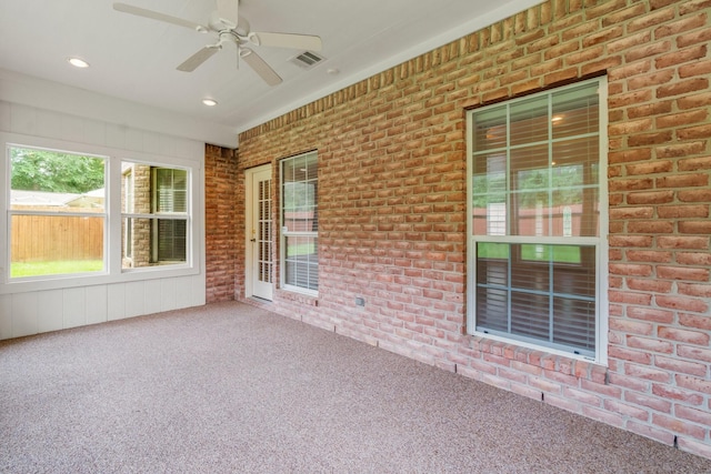104 Mccardell Ln, Livingston, TX 77351 - unfurnished sunroom featuring visible vents and a ceiling fan